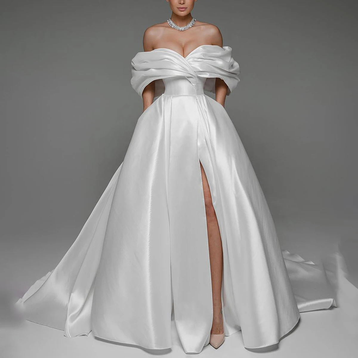 Vestidos Novia Satin Puffy Wedding Dress 2025 A Line Long Off Shoulder Bridal Party Gown With Train Backless Ball Gown For Women
Vestidos Novia Satin Puffy Wedding Dress 2025 A Line Long Off Shoulder Bridal Party Gown With Train Backless Ball Gown For Women