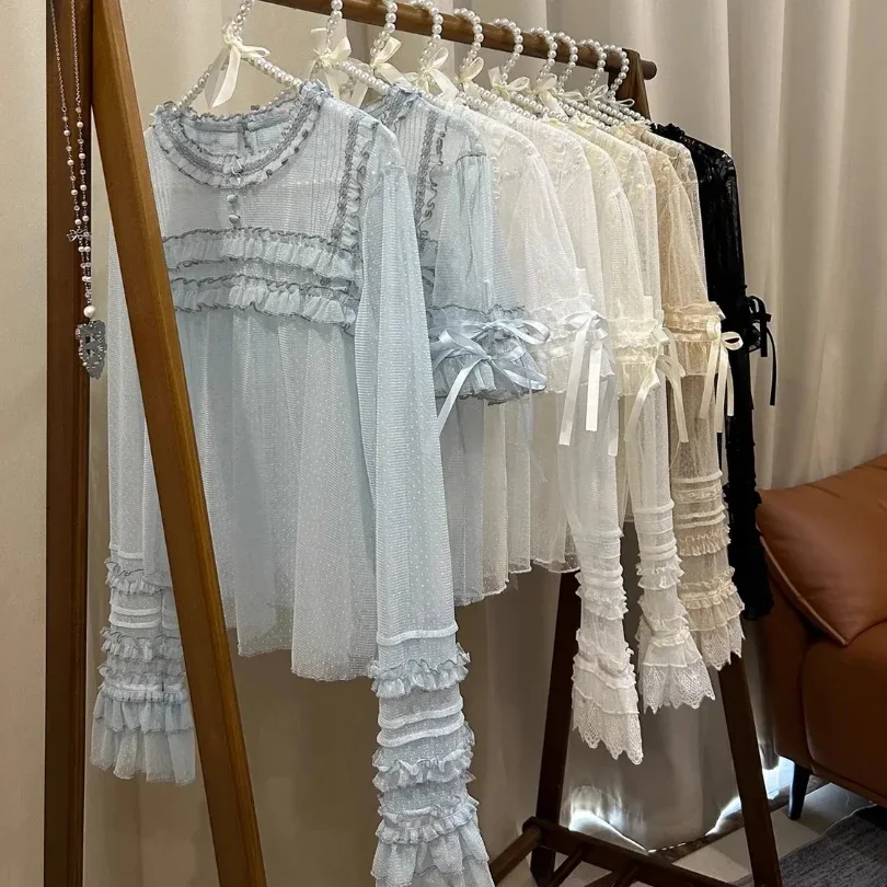 Japanese Y2k Aesthetic Sweet Flare Sleeve Bow Shirt Lolita Lace Patchwork Ruffled Women Blouse Harajuku See Through JK Blusas
Japanese Y2k Aesthetic Sweet Flare Sleeve Bow Shirt Lolita Lace Patchwork Ruffled Women Blouse Harajuku See Through JK Blusas