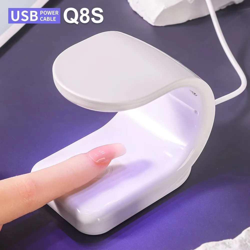 Mini Q-Shaped 6LED Nail Art UV Lamp USB Convenient Design Single Finger Nail Art Dryer Suitable for Gel Polish Manicure Tools
Mini Q-Shaped 6LED Nail Art UV Lamp USB Convenient Design Single Finger Nail Art Dryer Suitable for Gel Polish Manicure Tools