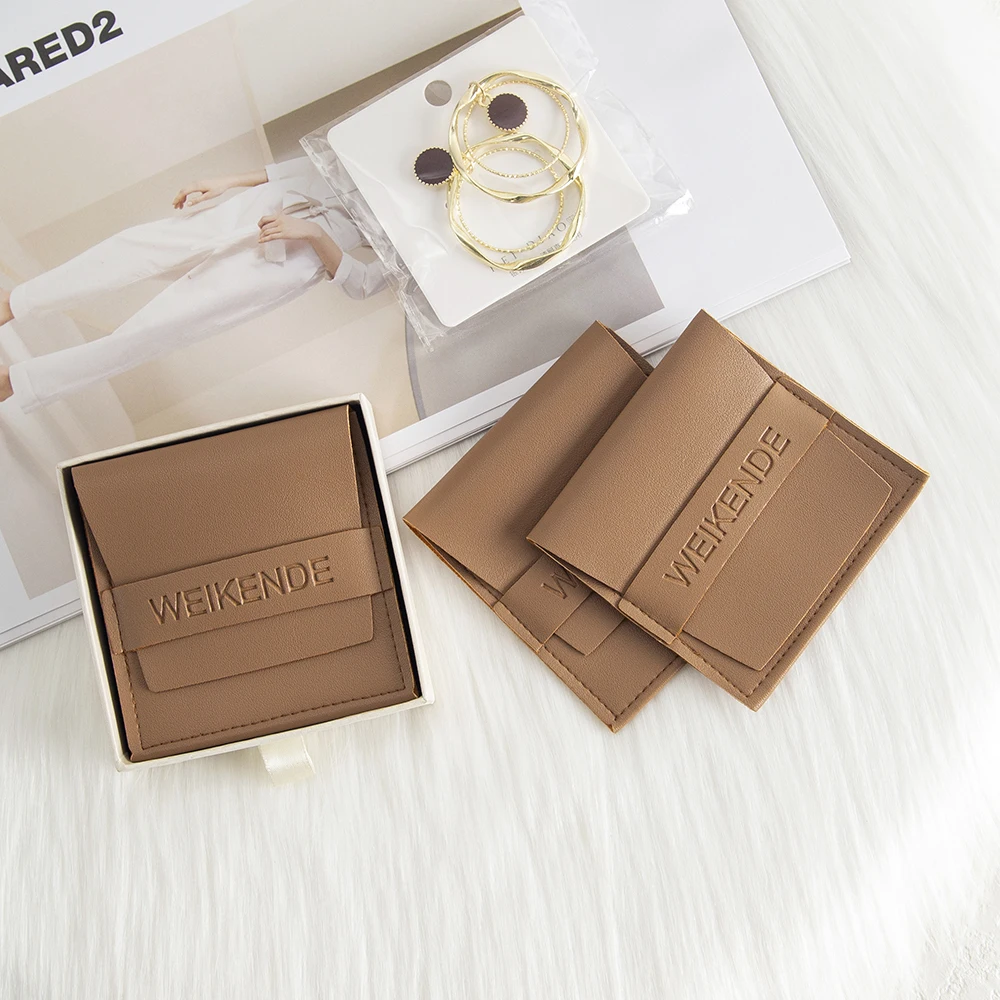 100pcs coffee PU Leather Jewelry Packaging Pouches Bags Custom Logo Small Gift Envelope Bags Necklace Bracelet Earrings Storage
100pcs coffee PU Leather Jewelry Packaging Pouches Bags Custom Logo Small Gift Envelope Bags Necklace Bracelet Earrings Storage