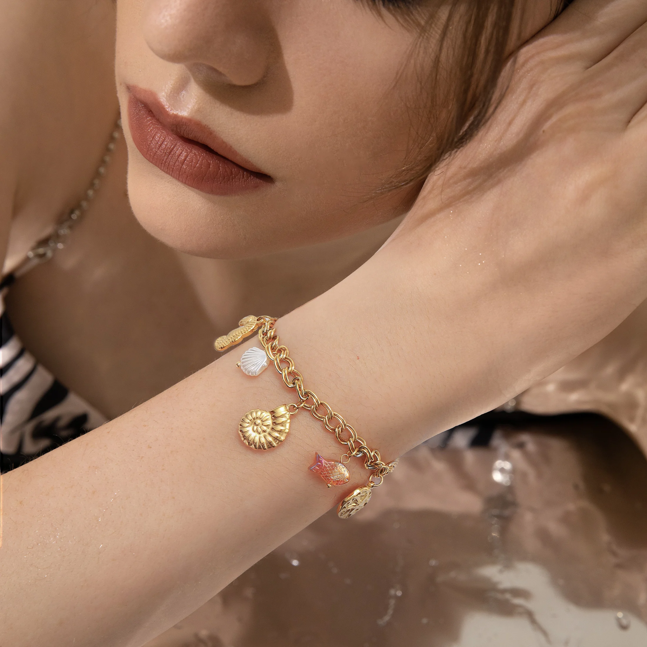 Golden Tone Stainless Steel Ocean Charm Bracelet with Seahorse and Fish Pendants for Women
Golden Tone Stainless Steel Ocean Charm Bracelet with Seahorse and Fish Pendants for Women