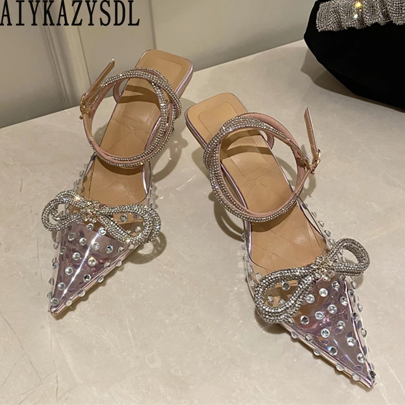 Женские туфли AIYKAZYSDL, прозрачные туфли-лодочки на тонком высоком каблуке, украшенные кристаллами, с бантом, 2022
Женские туфли AIYKAZYSDL, прозрачные туфли-лодочки на тонком высоком каблуке, украшенные кристаллами, с бантом, 2022