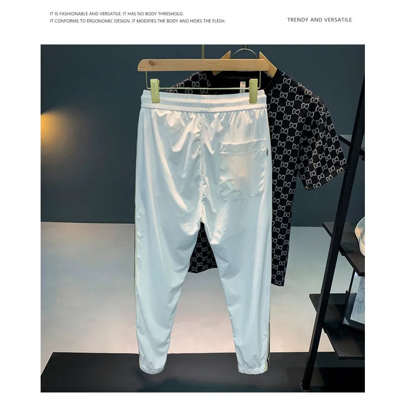 Summer thin ice silk casual pants for men, breathable, trendy, embroidered, simple, versatile, quick drying sports pants 
Summer thin ice silk casual pants for men, breathable, trendy, embroidered, simple, versatile, quick drying sports pants