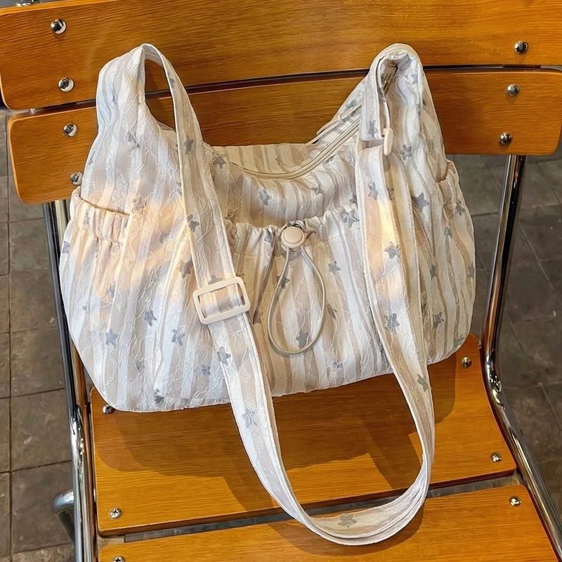 2026 new large-capacity canvas bag female Sen Meng summer niche one-shoulder messenger bag dumpling bag
2026 new large-capacity canvas bag female Sen Meng summer niche one-shoulder messenger bag dumpling bag