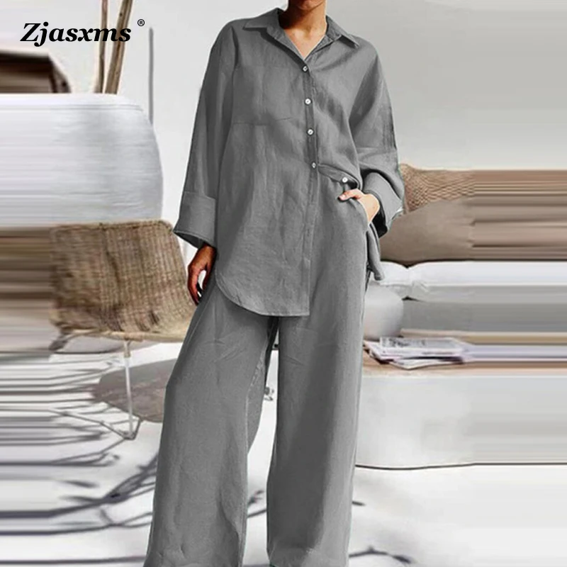 2023 Women Lapel Button Irregular Hem Shirt Wide-Leg Pocket Pant Set Fashion Casual Solid Color 2 Piece Suit Lady Office OL Suit
2023 Women Lapel Button Irregular Hem Shirt Wide-Leg Pocket Pant Set Fashion Casual Solid Color 2 Piece Suit Lady Office OL Suit