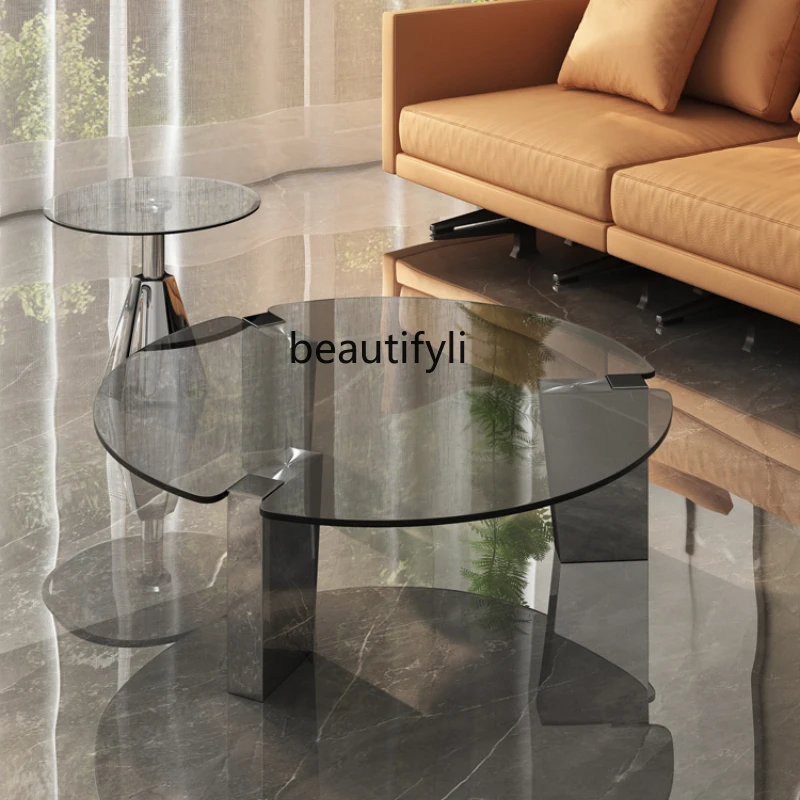 Round light luxury coffee table, tempered glass coffee table combination living room Italian minimalist wabi-sabi
Round light luxury coffee table, tempered glass coffee table combination living room Italian minimalist wabi-sabi