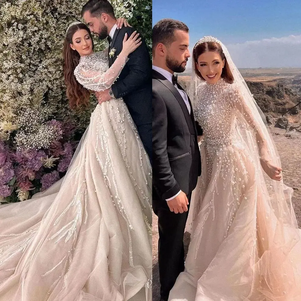 Luxury High Neck Wedding Dresses Beads Pearl Vestido de Noiva Satin Full Sleeve A Line Arabic Dubai Bridal Dress
Luxury High Neck Wedding Dresses Beads Pearl Vestido de Noiva Satin Full Sleeve A Line Arabic Dubai Bridal Dress
