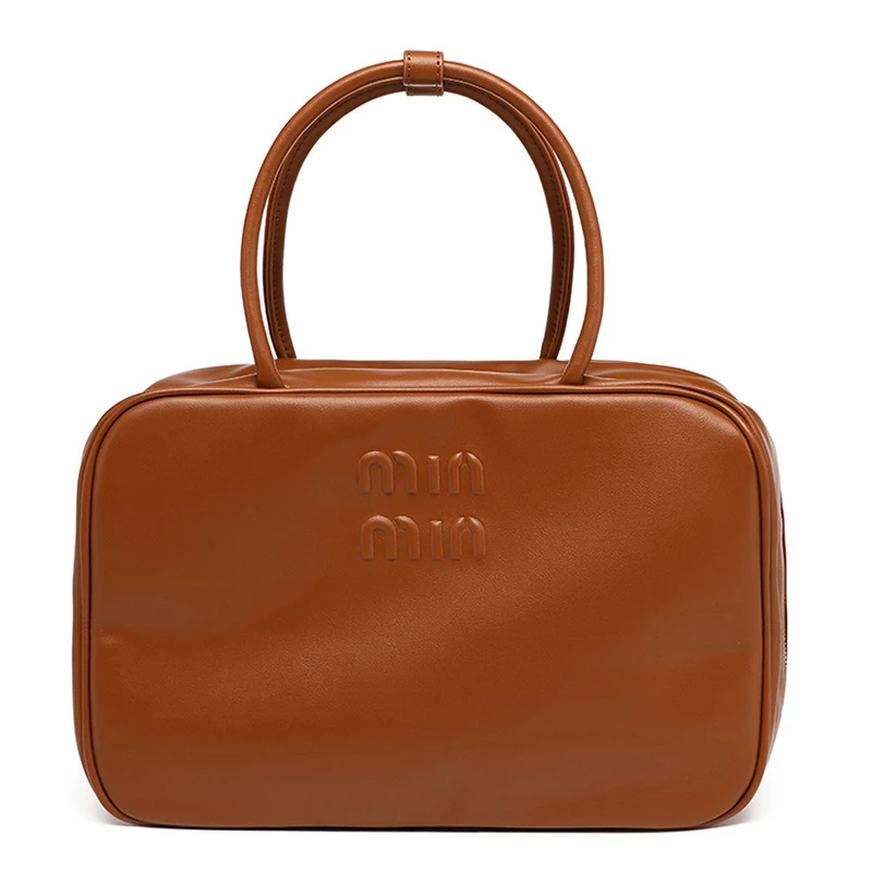 New European and American fashion bowling briefcase handbag for women, vintage versatile casual Boston bag handbag
New European and American fashion bowling briefcase handbag for women, vintage versatile casual Boston bag handbag