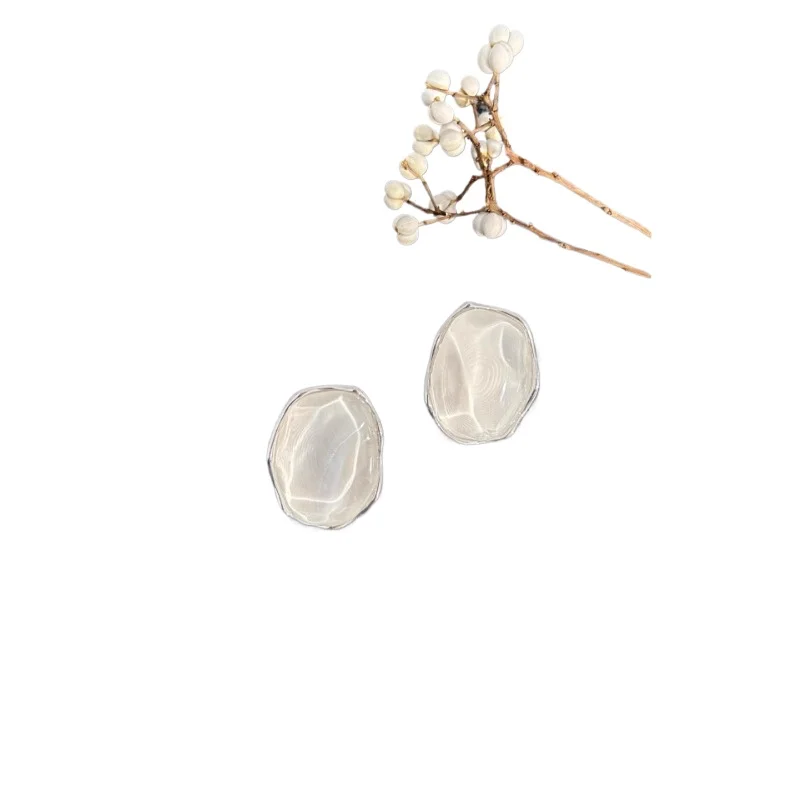 Sparkling transparent resin niche light luxury earrings for women
Sparkling transparent resin niche light luxury earrings for women