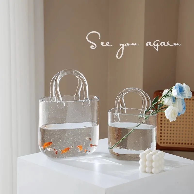 Nordic Handbag Glass Vase Japanese Fish Tank Transparent Advanced Living Room Hydroponic Flower Arrangement Ornament
Nordic Handbag Glass Vase Japanese Fish Tank Transparent Advanced Living Room Hydroponic Flower Arrangement Ornament
