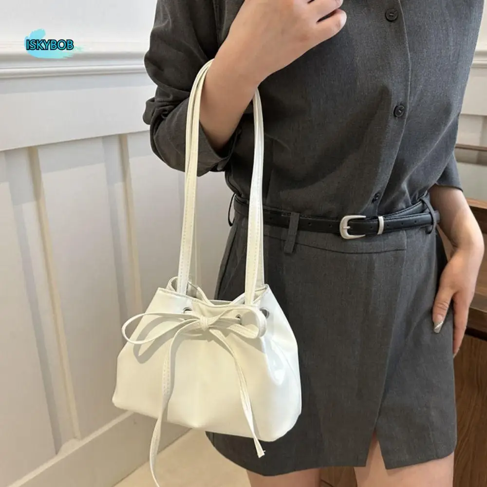 Creative Solid Color PU Bow Crossbody Bag Bucket Bag Mini INS Shoulder Bag Korean Style Portable Fashion Underarm Bag Decoration
Creative Solid Color PU Bow Crossbody Bag Bucket Bag Mini INS Shoulder Bag Korean Style Portable Fashion Underarm Bag Decoration