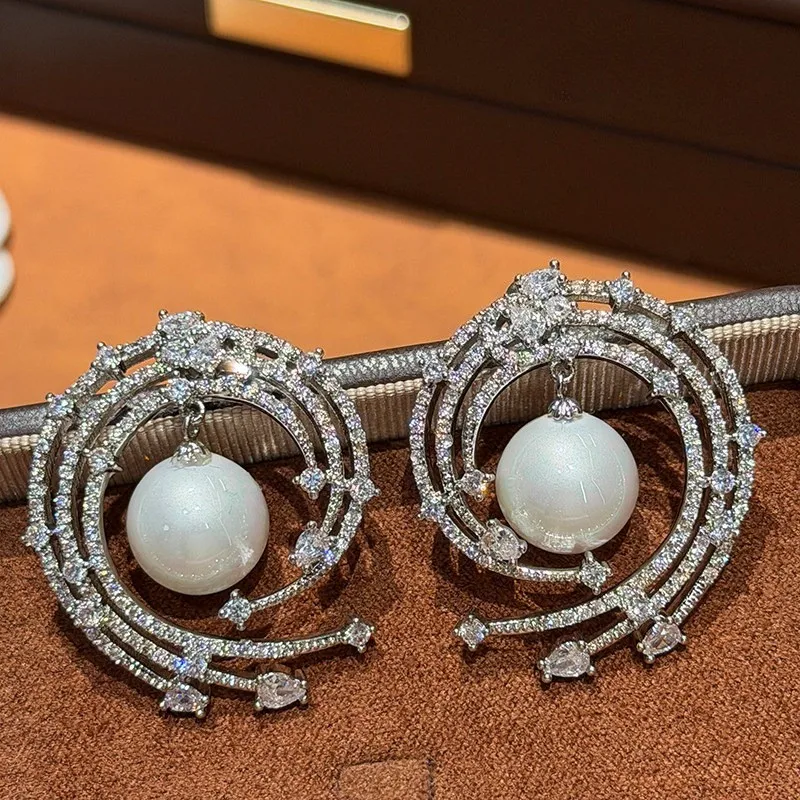 Zircon Pearl Luxury Fringed Fashion New Temperament Earrings
Zircon Pearl Luxury Fringed Fashion New Temperament Earrings