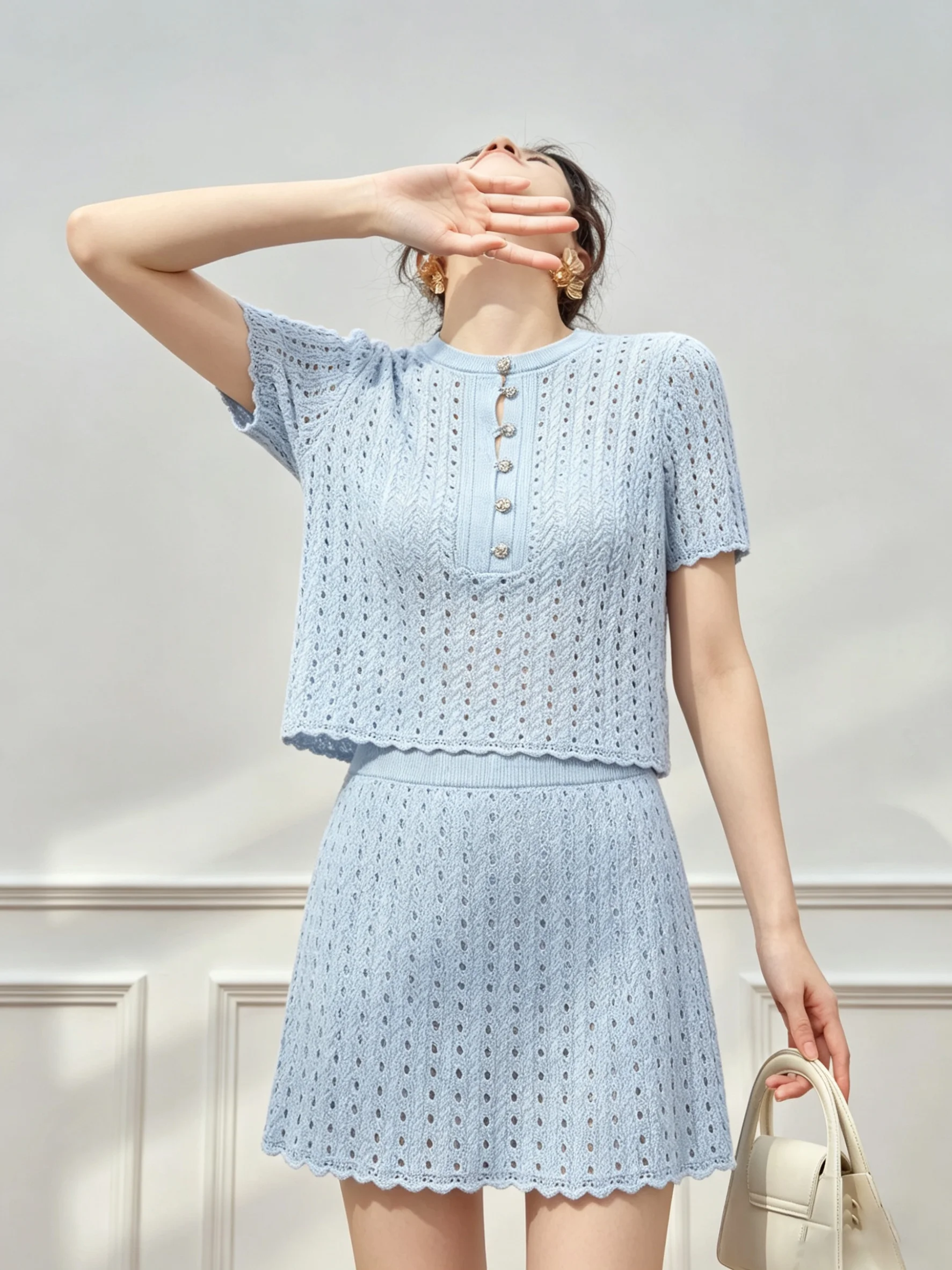 Blue Knitted Hollow out Short Sleeve Top And Half Skirt Set Women's Fashion Summer Anti-Aging Clothing High Waist Style
Blue Knitted Hollow out Short Sleeve Top And Half Skirt Set Women's Fashion Summer Anti-Aging Clothing High Waist Style