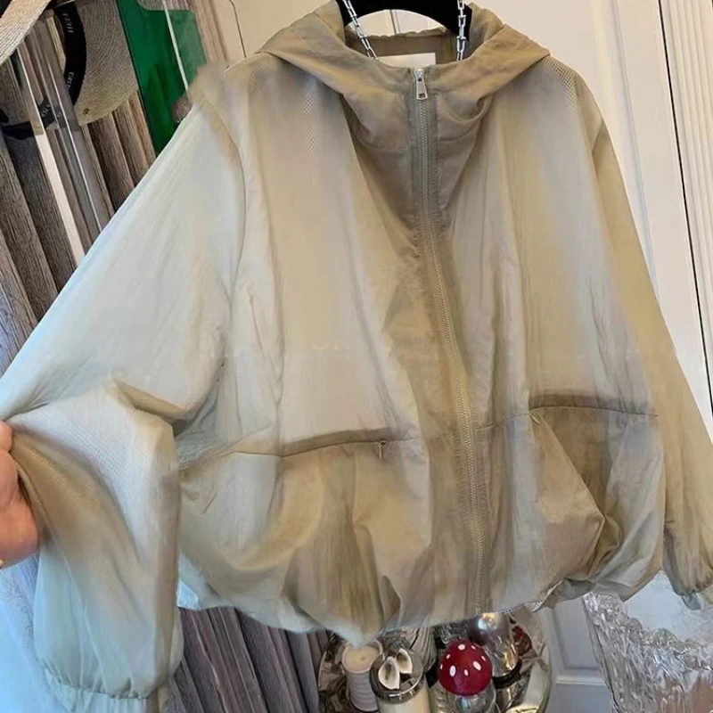2024 Summer Women's Thin Hooded Sports Drawstring Zipper Pocket Sunscreen Coat Commuter Casual Sheer Comfortable Jackets Tops
2024 Summer Women's Thin Hooded Sports Drawstring Zipper Pocket Sunscreen Coat Commuter Casual Sheer Comfortable Jackets Tops