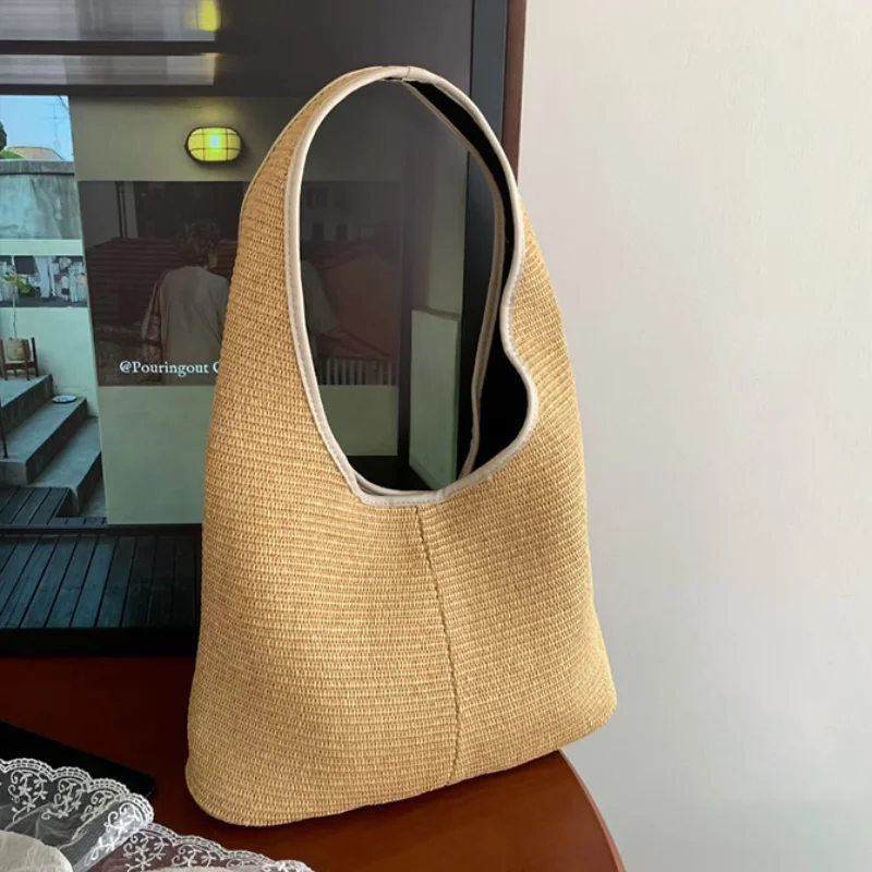 Новая ретро-сумка через плечо из соломки для женщин, плетеная сумка-тоут, модная простая повседневная пляжная сумка для отпуска, универсальная сумка-тоут
Новая ретро-сумка через плечо из соломки для женщин, плетеная сумка-тоут, модная простая повседневная пляжная сумка для отпуска, универсальная сумка-тоут