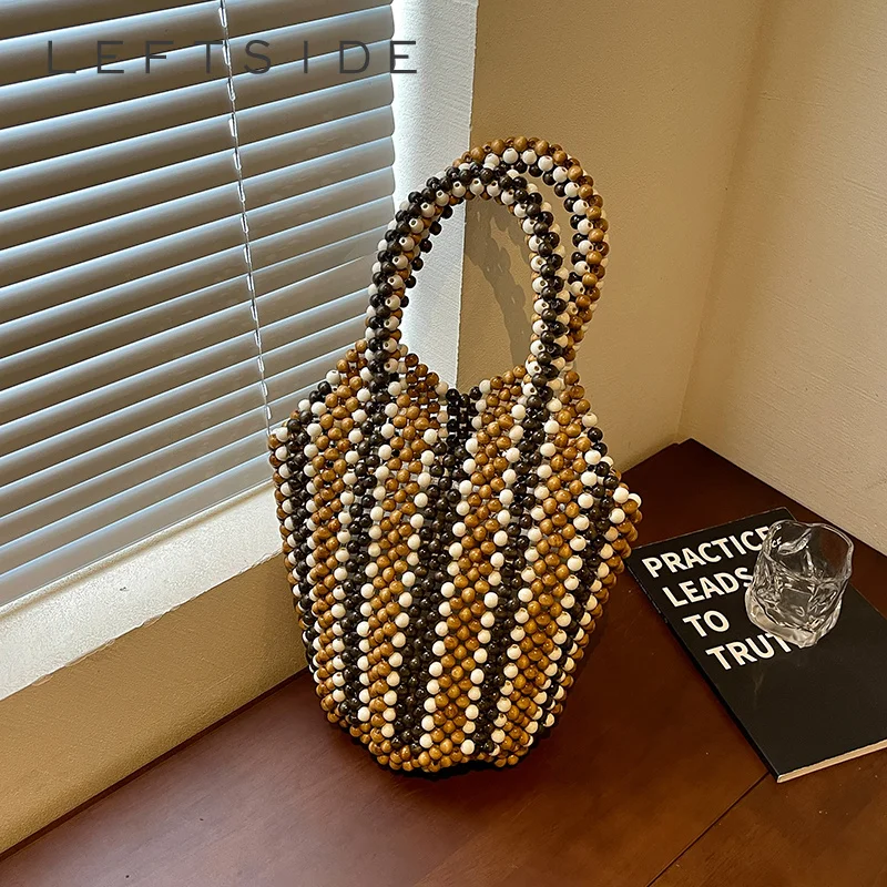 Women Wooden Bead Woven Tote Bag Round Bead Ring Top Handle Summer Beach Travel Shopping Shoulder Bags 2026 New Fashion Handbag
Women Wooden Bead Woven Tote Bag Round Bead Ring Top Handle Summer Beach Travel Shopping Shoulder Bags 2026 New Fashion Handbag