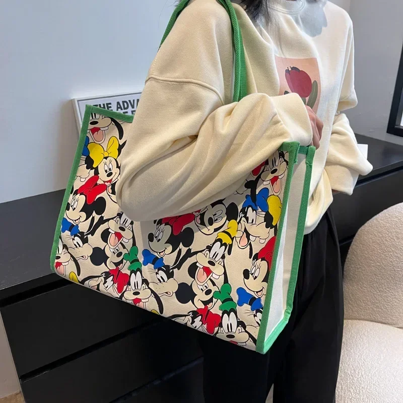 Disney cartoon Mickey Mouse canvas shoulder bag female tote bag 2022 new handbag shopping bag shoulder tote
Disney cartoon Mickey Mouse canvas shoulder bag female tote bag 2022 new handbag shopping bag shoulder tote