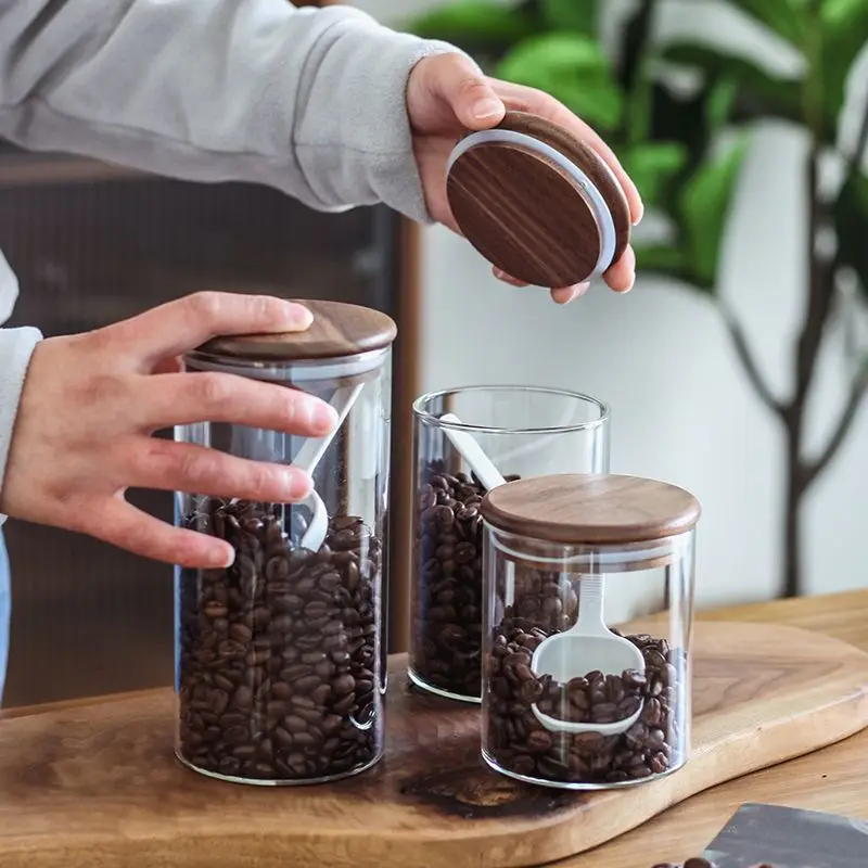 Black Walnut Wood Lid glass bottle Airtight Jar with Built-in Scoop - for tea coffee sugar storage jars mason jars with lids 
Black Walnut Wood Lid glass bottle Airtight Jar with Built-in Scoop - for tea coffee sugar storage jars mason jars with lids
