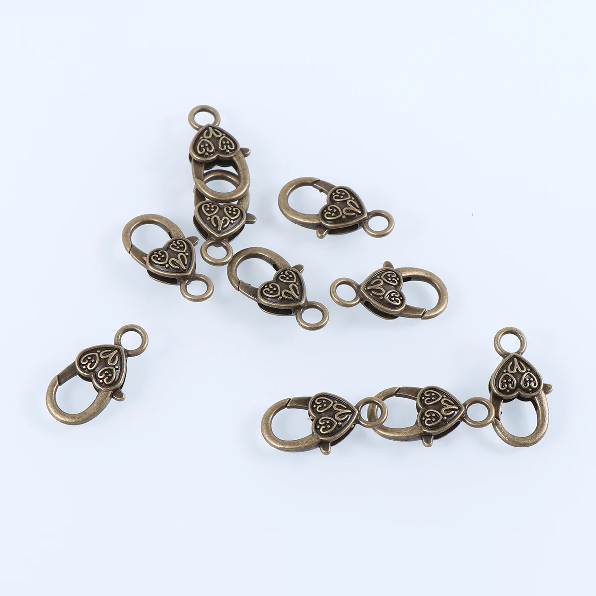 20pcs Heart Shape Lobster Clasps Alloy Jewelry Making Supplies Necklace Bracelet Earrings Craft for Creative
20pcs Heart Shape Lobster Clasps Alloy Jewelry Making Supplies Necklace Bracelet Earrings Craft for Creative