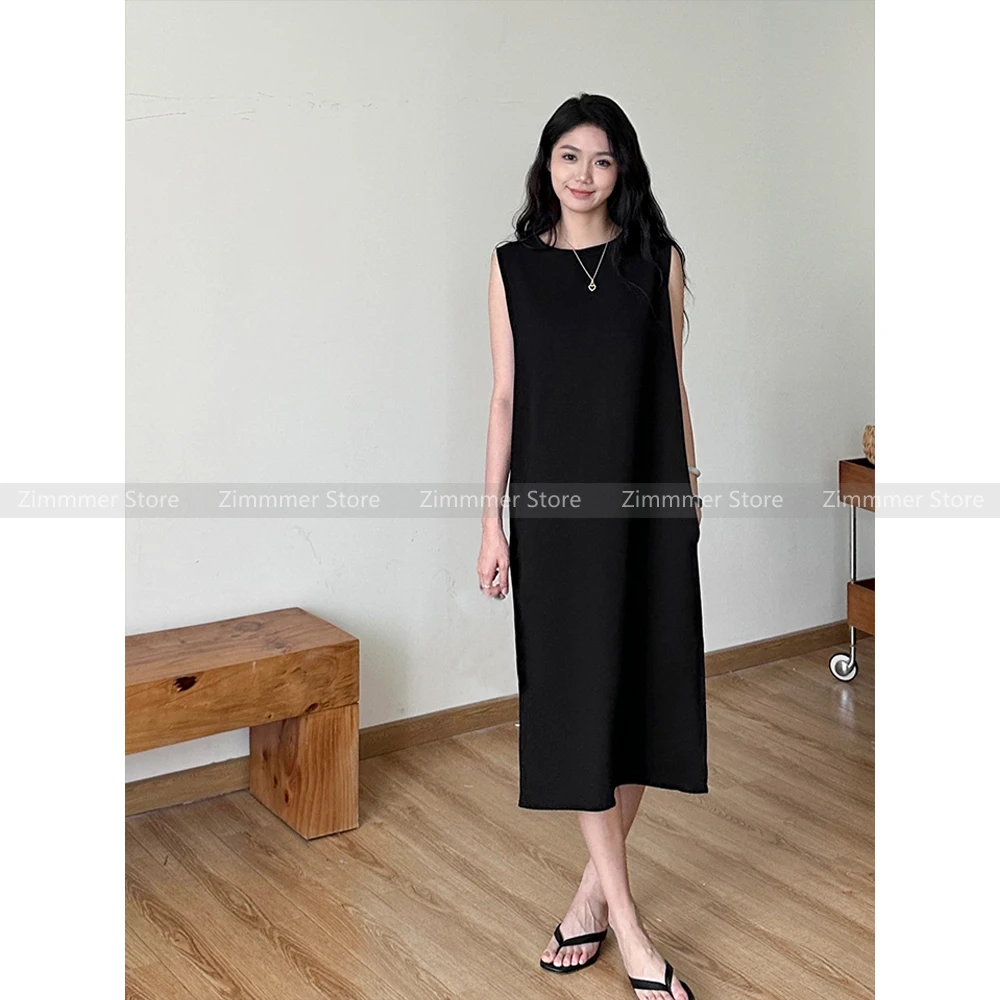 New minimalist black triacetate straight long loose temperament small black dress dress women
New minimalist black triacetate straight long loose temperament small black dress dress women