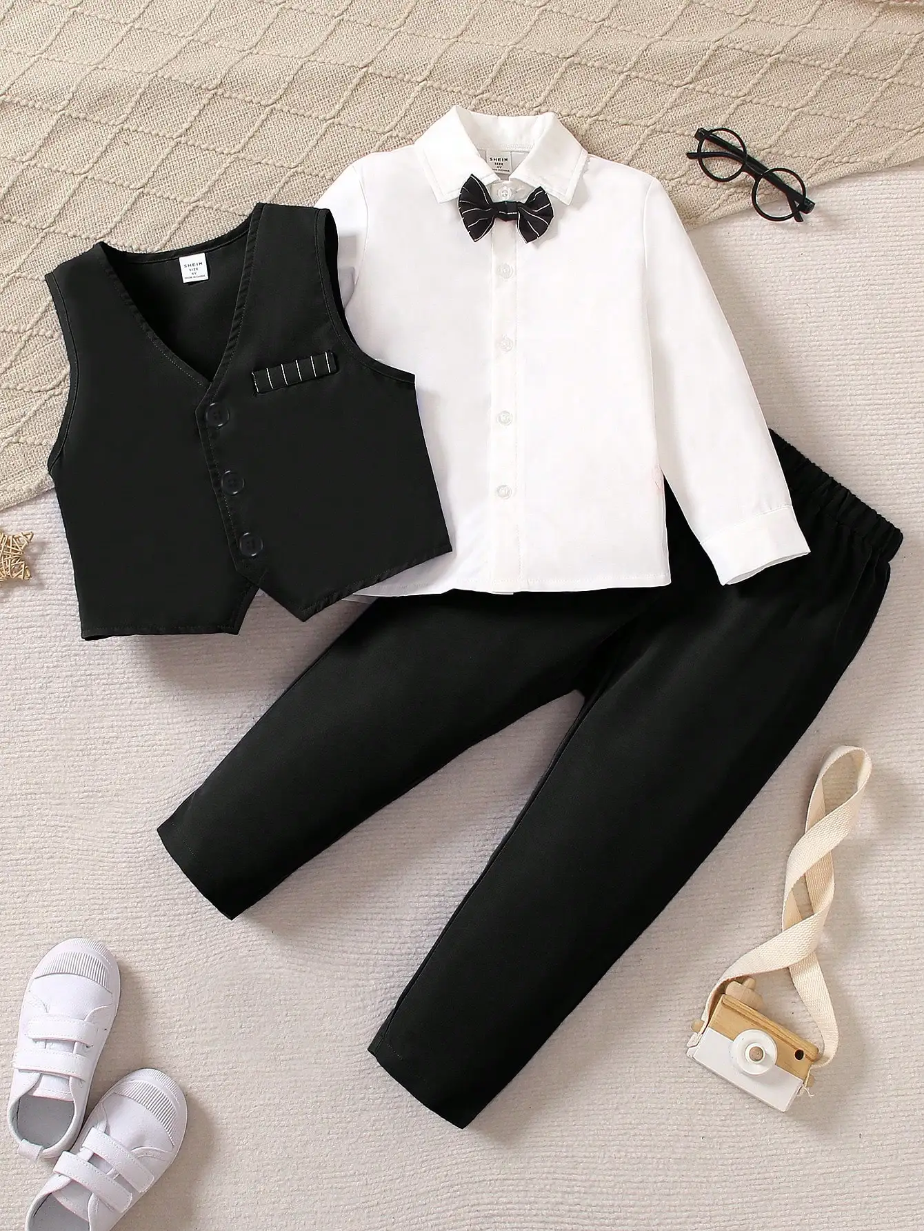 3-Piece Formal Outfit Set for Boys: White Shirt, Black Vest & Pants with Bow Tie
3-Piece Formal Outfit Set for Boys: White Shirt, Black Vest & Pants with Bow Tie