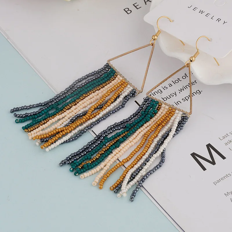 ZGMXR Серьги из рисовых бусин Треугольник Радуга Оригинальный дизайн Кисточка Богемия Ручное вязание Сплав Модные простые серьги из бисера
ZGMXR Серьги из рисовых бусин Треугольник Радуга Оригинальный дизайн Кисточка Богемия Ручное вязание Сплав Модные простые серьги из бисера