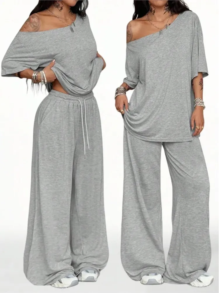 Women 2 Piece Loungewear Set Slanted Off Shoulder Half Sleeve Loose T-Shirt Elastic Waist Wide Leg Sweatpants Casual Tracksuit
Women 2 Piece Loungewear Set Slanted Off Shoulder Half Sleeve Loose T-Shirt Elastic Waist Wide Leg Sweatpants Casual Tracksuit