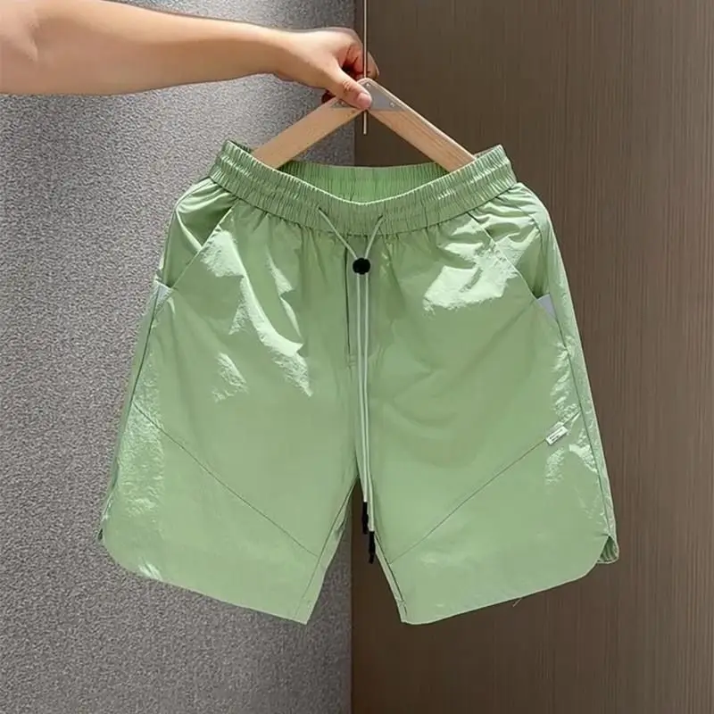 New Summer Trendy Punched Breathable Quick-drying Shorts Fashionable Loose Simple Ice Silk Casual Sports Five-point Pants Chic
New Summer Trendy Punched Breathable Quick-drying Shorts Fashionable Loose Simple Ice Silk Casual Sports Five-point Pants Chic
