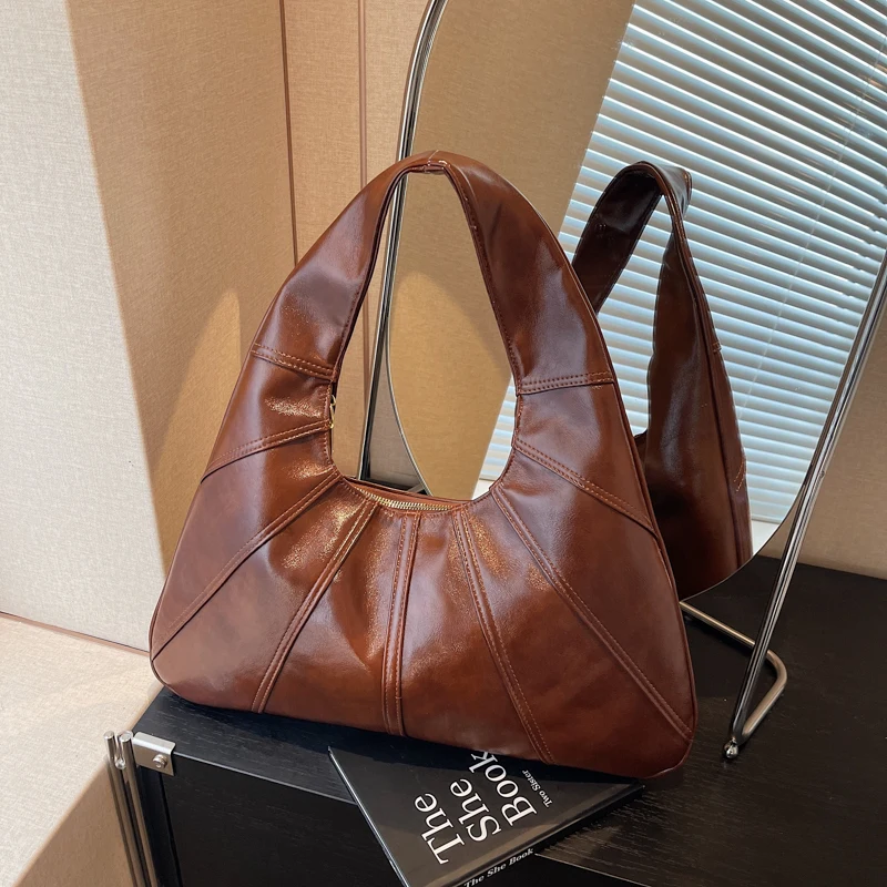 Fashionable solid color casual minimalist commuting large capacity shoulder bag tote bag pleated versatile armpit bag
Fashionable solid color casual minimalist commuting large capacity shoulder bag tote bag pleated versatile armpit bag