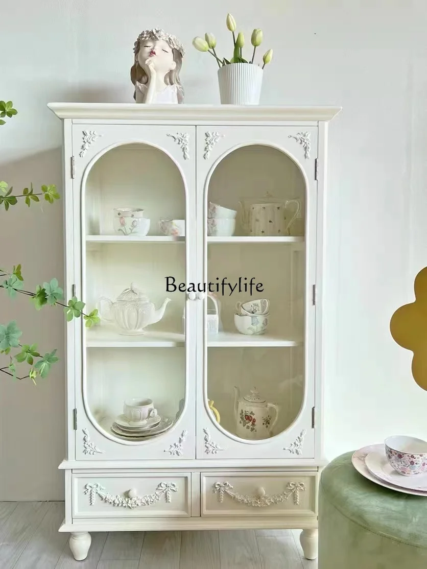 French solid wood cream style fashionable simple engraving retro dining side cabinet
French solid wood cream style fashionable simple engraving retro dining side cabinet