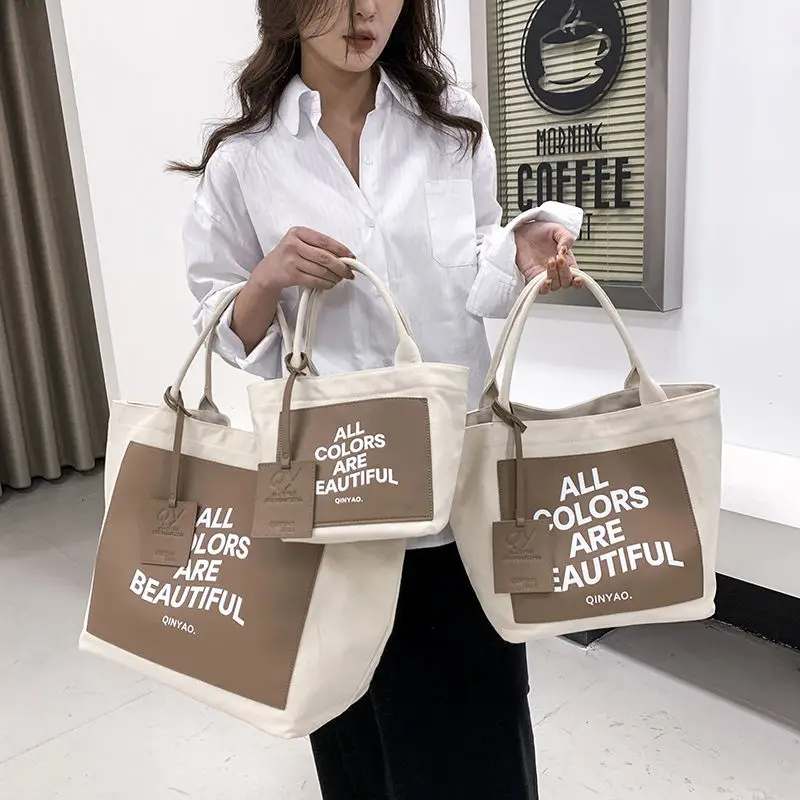 2023 korean japan style 3 sizes magazine bag fashion letter canvas bag shopping bag shoulder bag portable shoulder tote bag
2023 korean japan style 3 sizes magazine bag fashion letter canvas bag shopping bag shoulder bag portable shoulder tote bag