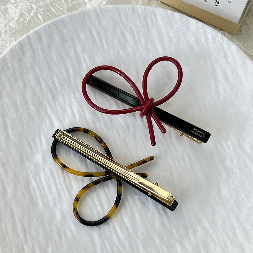 Korean Simple Temperament Hair Side Clip Acetic Acid Bangs Edge Clip Gold Label Hollow Out Bow Duckbill Clip Styling Headwear
Korean Simple Temperament Hair Side Clip Acetic Acid Bangs Edge Clip Gold Label Hollow Out Bow Duckbill Clip Styling Headwear