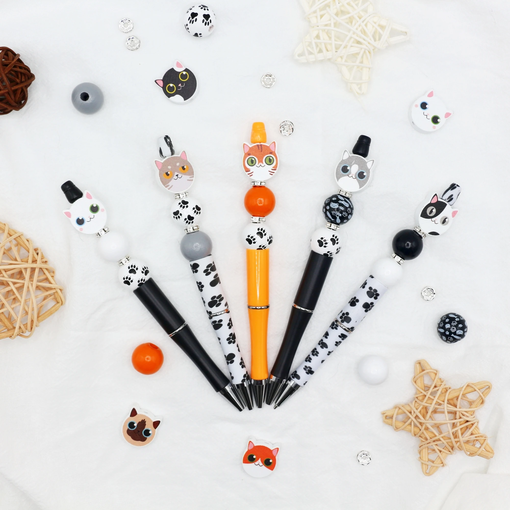 9 PCS of colorful cute cat themed DIY bead black ink ballpoint pen and wooden bead set, with 10 cute cat wooden beads
9 PCS of colorful cute cat themed DIY bead black ink ballpoint pen and wooden bead set, with 10 cute cat wooden beads