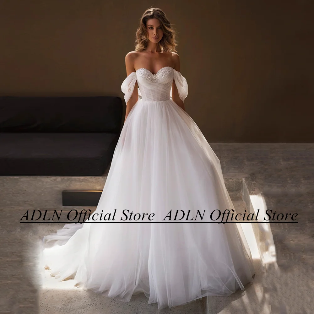ADLN Soft Tulle Wedding Dress for Women Bride Off The Shoulder Sweetheart Pearls Applique Pleat A Line Backless Bridal Gown
ADLN Soft Tulle Wedding Dress for Women Bride Off The Shoulder Sweetheart Pearls Applique Pleat A Line Backless Bridal Gown