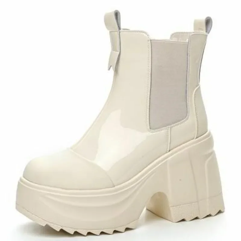 Женские ботинки из лакированной микрофибры 10 см на очень толстой подошве, весенне-осенние мотоциклетные ботинки, женские ботильоны в британском стиле
Женские ботинки из лакированной микрофибры 10 см на очень толстой подошве, весенне-осенние мотоциклетные ботинки, женские ботильоны в британском стиле