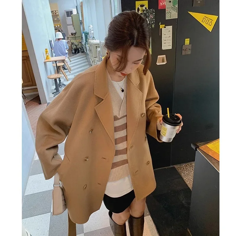Korean drama female lead double-sided cashmere coat women's short small high-end camel lace-up double-breasted woolen coat
Korean drama female lead double-sided cashmere coat women's short small high-end camel lace-up double-breasted woolen coat