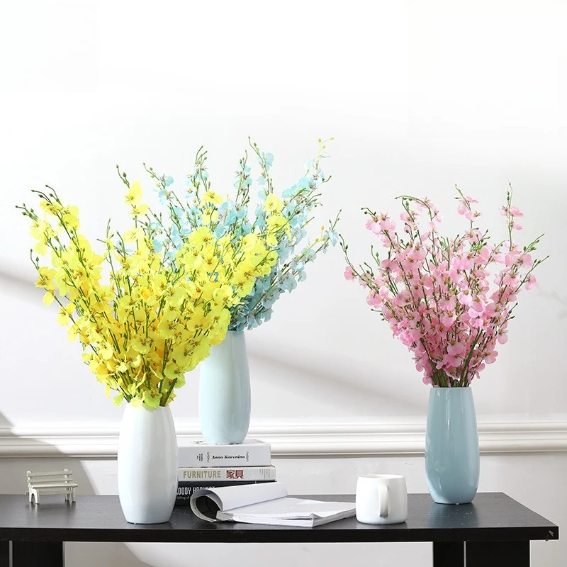 5-pronged artificial flower dancing orchid yellow fake flower Phalaenopsis bouquet wedding home decoration ornaments 10 pcs 
5-pronged artificial flower dancing orchid yellow fake flower Phalaenopsis bouquet wedding home decoration ornaments 10 pcs