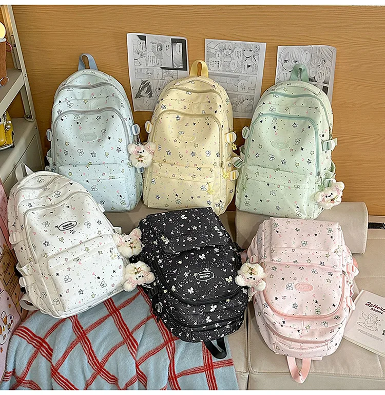 Студенческая школьная сумка большой вместимости с принтом звездного банта, дышащий широкий плечевой ремень, милый дорожный рюкзак для девочек
Студенческая школьная сумка большой вместимости с принтом звездного банта, дышащий широкий плечевой ремень, милый дорожный рюкзак для девочек