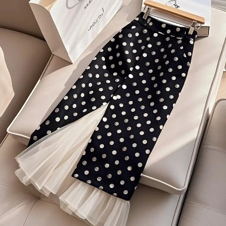 French polka dot skirt women's 2025 summer new high waist and thin irregular split fork medium and long hip skirt
French polka dot skirt women's 2025 summer new high waist and thin irregular split fork medium and long hip skirt