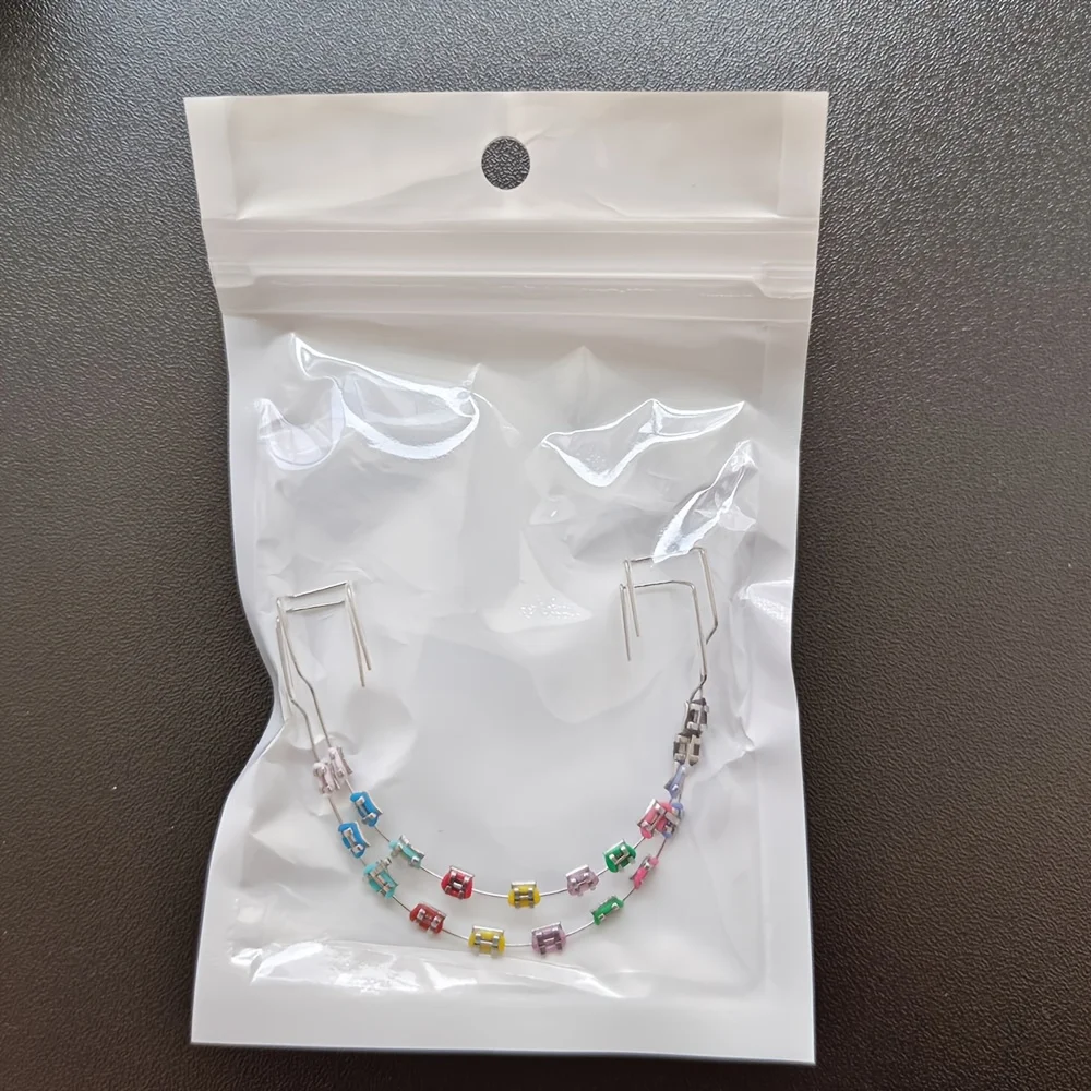1 Pair Of Metal Wire Colored Temporary Dental Decoration, Denture Tray, Orthodontic Accessories, Dental Decoration H2931-66.6
1 Pair Of Metal Wire Colored Temporary Dental Decoration, Denture Tray, Orthodontic Accessories, Dental Decoration H2931-66.6
