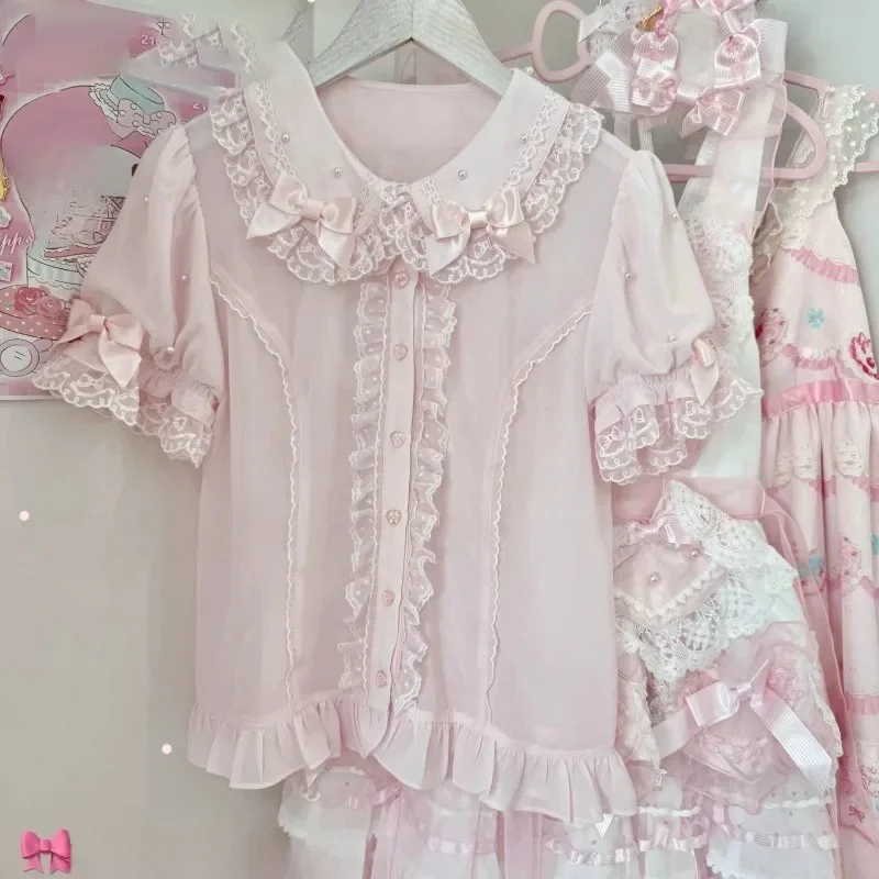 Japanese Lolita Pearl Bow Patchwork Lace Shirt Women Sweet Solid Ruffle Short Sleeve Tops Fairy Kawaii Sheer Y2k Blouse
Japanese Lolita Pearl Bow Patchwork Lace Shirt Women Sweet Solid Ruffle Short Sleeve Tops Fairy Kawaii Sheer Y2k Blouse