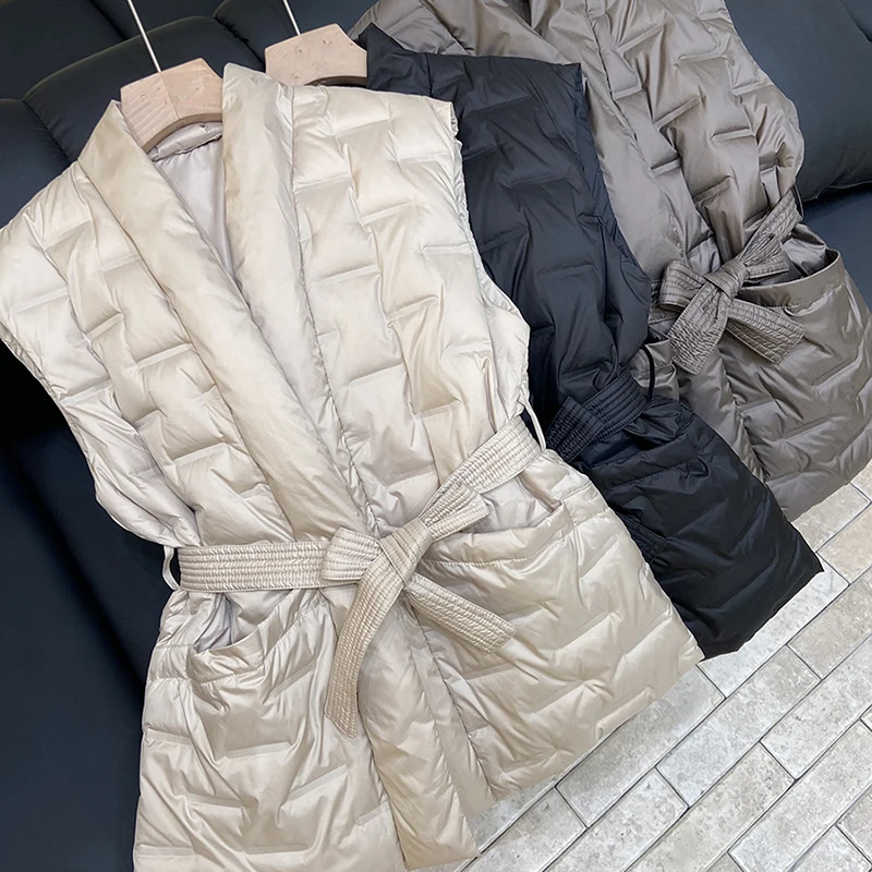 Модный простой зимний жилет, однотонная повседневная куртка без рукавов с поясом, женская универсальная верхняя одежда с v-образным вырезом и утиным пухом
Модный простой зимний жилет, однотонная повседневная куртка без рукавов с поясом, женская универсальная верхняя одежда с v-образным вырезом и утиным пухом