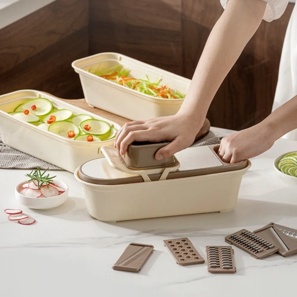 Efficient Manual Vegetable Cutter with Hand Protector Speedy Slicing Kitchen Grater With Box Plastic Vegetable Slice Meal Prep
Efficient Manual Vegetable Cutter with Hand Protector Speedy Slicing Kitchen Grater With Box Plastic Vegetable Slice Meal Prep