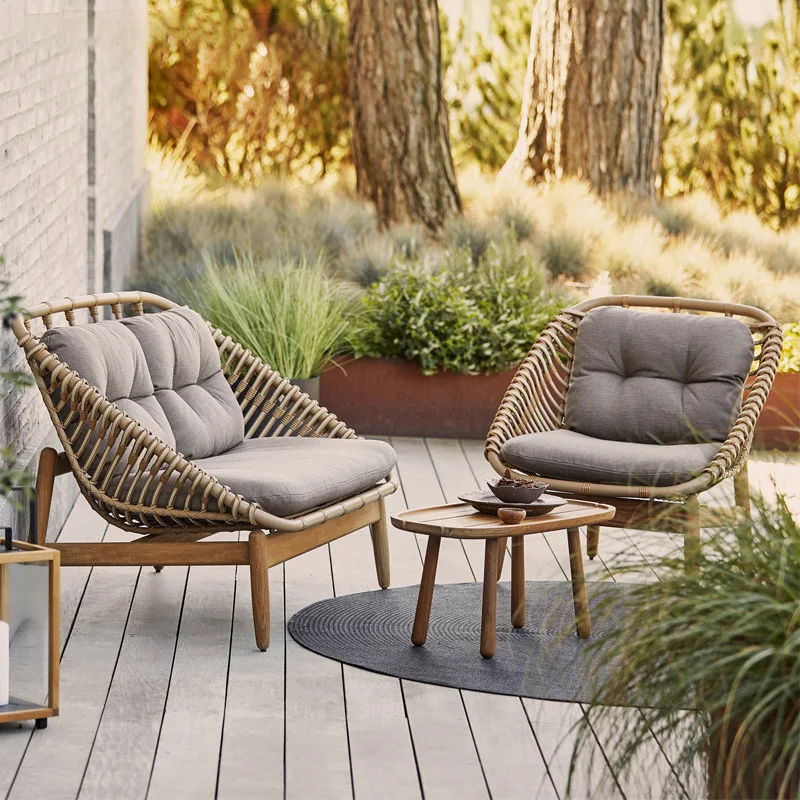 Уличный диван из тикового дерева, современный минималистичный дизайнерский одиночный диван из ротанга, отель, вилла, элитный балкон, кресло из ротанга для отдыха
Уличный диван из тикового дерева, современный минималистичный дизайнерский одиночный диван из ротанга, отель, вилла, элитный балкон, кресло из ротанга для отдыха