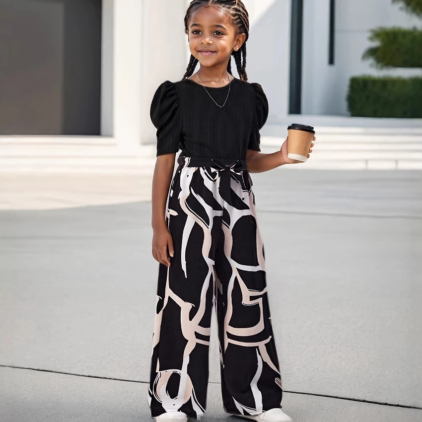 New 2025 Girls Summer Clothing Sets Puff Short Sleeve O-neck Solid T-shirt Tops + Fashion Print Loose Wide-leg Trousers
New 2025 Girls Summer Clothing Sets Puff Short Sleeve O-neck Solid T-shirt Tops + Fashion Print Loose Wide-leg Trousers