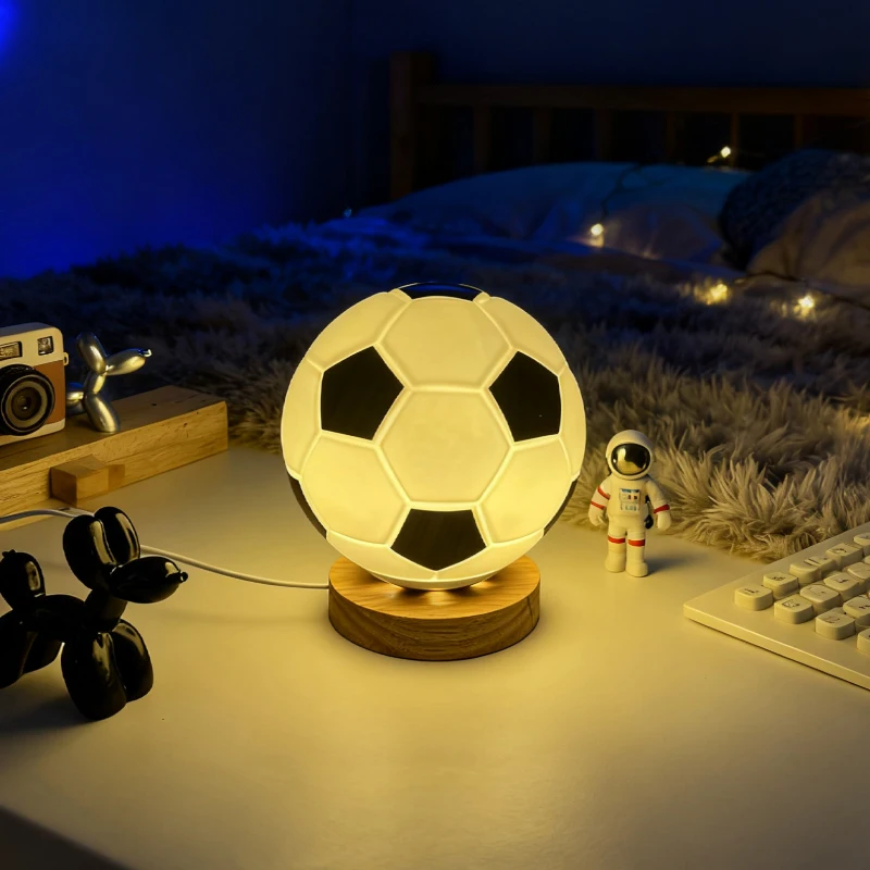 Настольная лампа из массива дерева и стекла в виде футбольного мяча, креативная светодиодная лампа для спальни, прикроватная лампа для кабинета, декоративная лампа для создания атмосферы
Настольная лампа из массива дерева и стекла в виде футбольного мяча, креативная светодиодная лампа для спальни, прикроватная лампа для кабинета, декоративная лампа для создания атмосферы