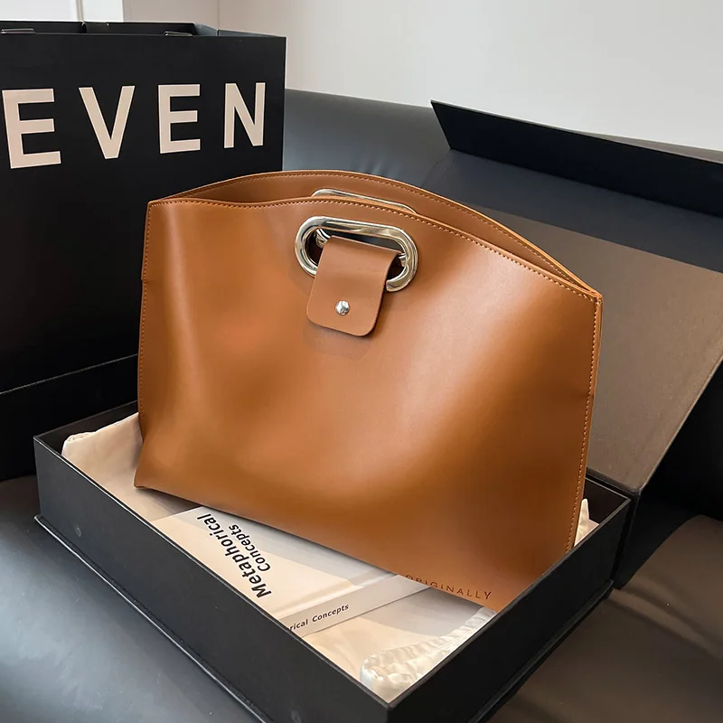 Сумки для женщин, новая модная большая вместительная сумка-тоут, темпераментная дорожная сумка для ноутбука, мужской портфель из искусственной кожи, элегантный вечерние клатч
Сумки для женщин, новая модная большая вместительная сумка-тоут, темпераментная дорожная сумка для ноутбука, мужской портфель из искусственной кожи, элегантный вечерние клатч