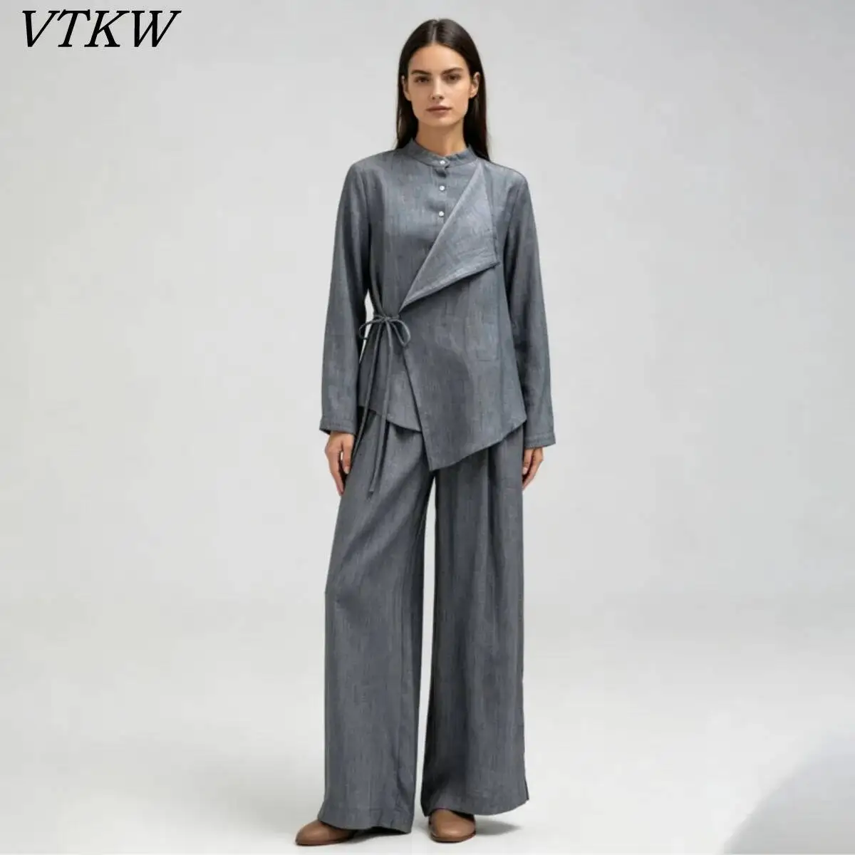 VTKW 2026 New Women Mandarin Collar Asymmetric Wrap Tie Waist Linen Blazer Wide Leg Pants Two Piece Minimalist Daily Suit Set
VTKW 2026 New Women Mandarin Collar Asymmetric Wrap Tie Waist Linen Blazer Wide Leg Pants Two Piece Minimalist Daily Suit Set
