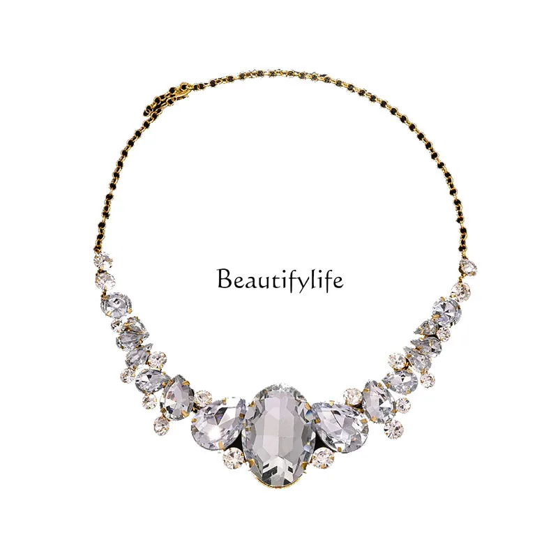 Multi-layer water drop-shaped glass diamond accessories super flash banquet bridal accessories
Multi-layer water drop-shaped glass diamond accessories super flash banquet bridal accessories