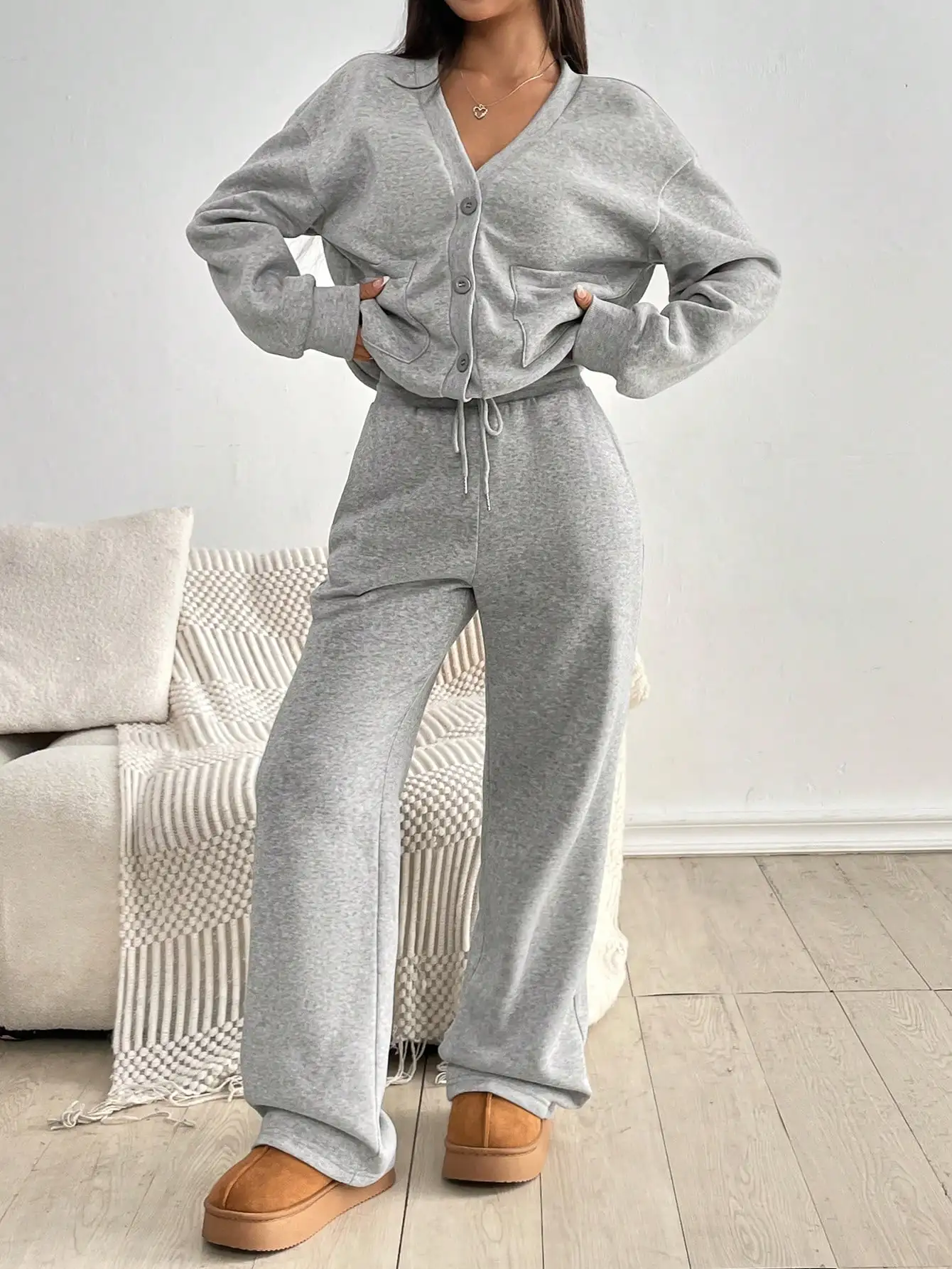 Gray 2 Piece Set Women Casual V-Neck Buttoned Cardigan With Pockets And Straight Leg Sweatpants
Gray 2 Piece Set Women Casual V-Neck Buttoned Cardigan With Pockets And Straight Leg Sweatpants